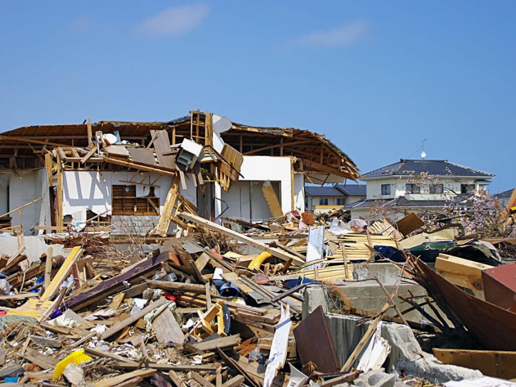 フリー素材サイトから取得した地震のイメージ
